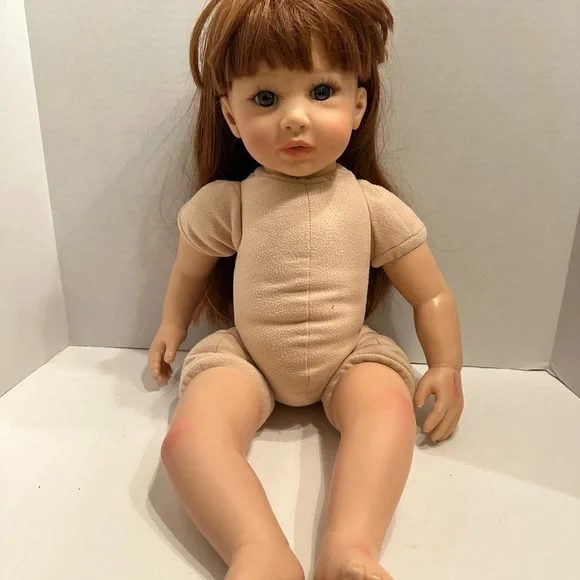 Reborn Doll with Chestnut Hair and Deep Blue Eyes Realistic Newborn Cloth Vinyl - Picture 5 of 8